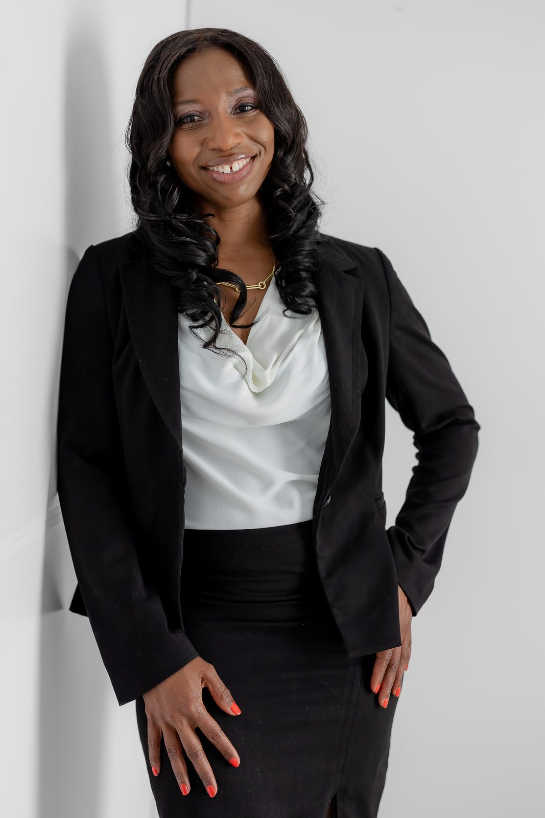 Business portrait on white wall