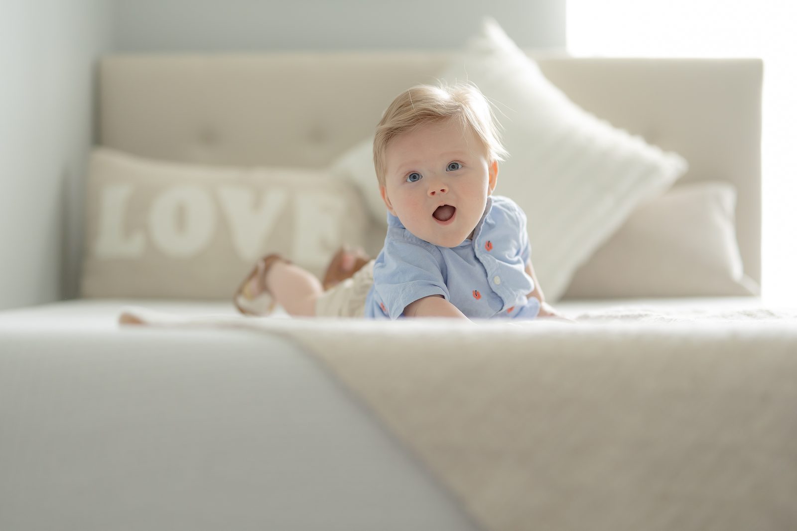 Six-month-old lifestyle session at home with LOVE pillow